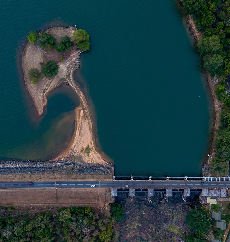 Aerial view of the Udawalawe reservoir and dam